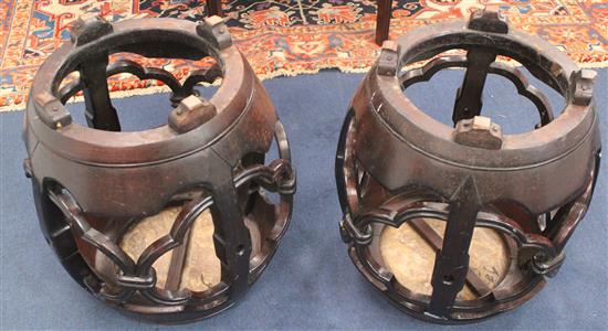 A pair of late 19th century Chinese marble inset rosewood barrel shaped stands or stools, H.53cm